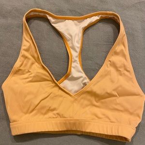 Neon orange sports bra